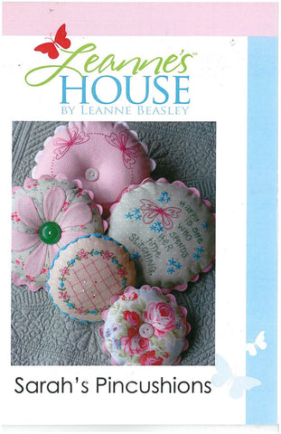 Includes five patterns:  Pretty Little Floral Pincushion 2-7" x 7"  Circle of Friendship Pincushion 2-8" x 8"  Happy is She Who Spends Her Time Stitching Pincushion 2-9" x 9"  Big Pink Daisy Pincushion 2-9" x 9"  Four Friendly Butterflies Pincushion 2-9" x 9"
