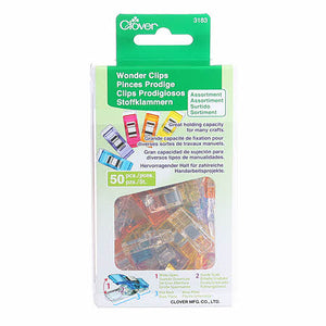 An assortment of colors for an assortment of uses.  Since their introduction primarily for seam binding on quilts, they have been adopted by crafters, beaders, scrapbookers, card makers and every craft where a third hand is needed to hold something down, together or in place. They make a great gift for any crafter or home sewer.